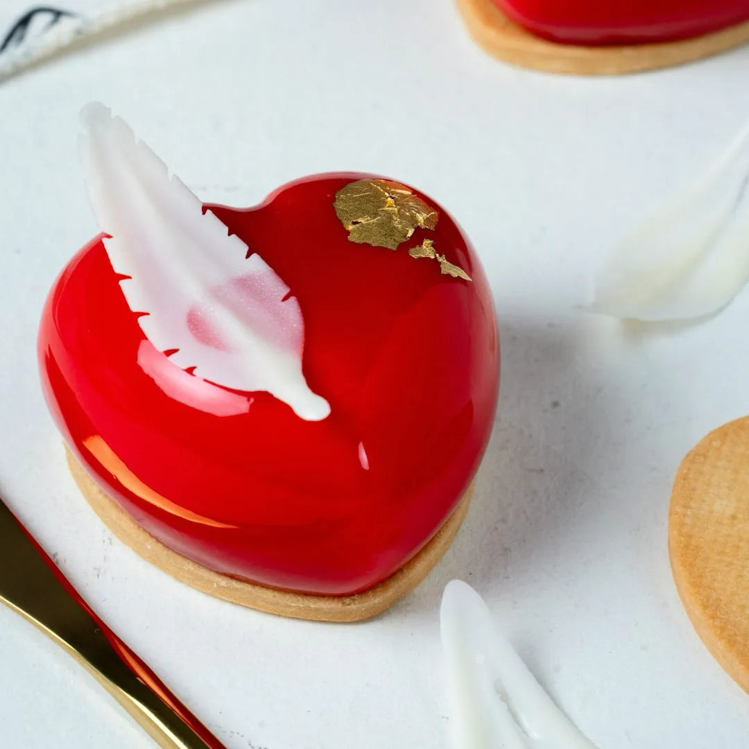 Mini Gateaux: Corazón de Frambuesa, Tarta Banoffee, Lingote de Naranja y Tarta de Arándanos