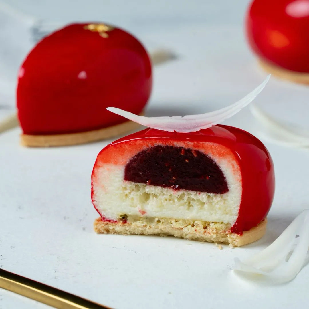 Mini Gateaux: Corazón de Frambuesa, Tarta Banoffee, Lingote de Naranja y Tarta de Arándanos