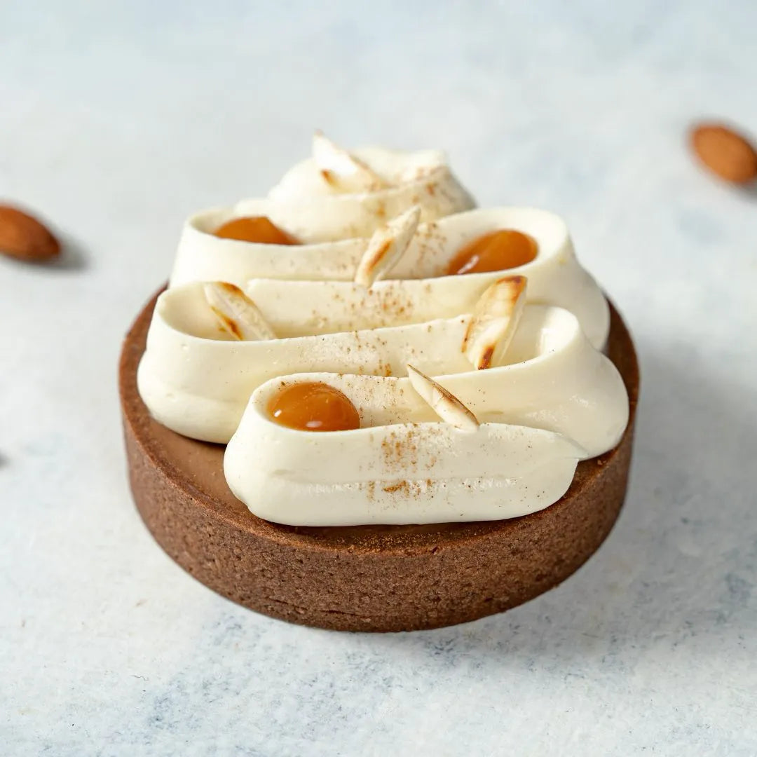 Mini Gateaux: Corazón de Frambuesa, Tarta Banoffee, Lingote de Naranja y Tarta de Arándanos